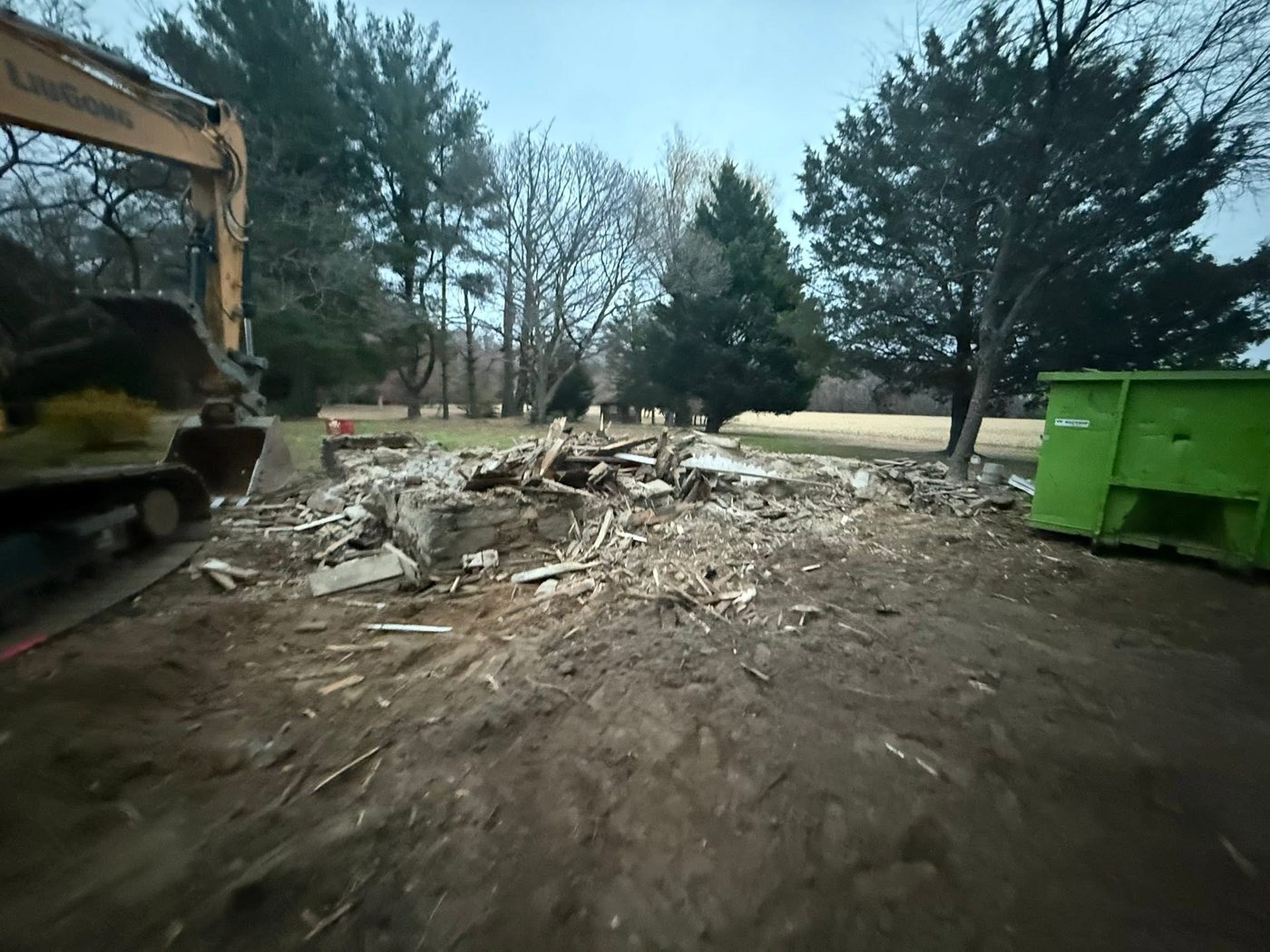 A foundation broken out and staged for hauling